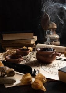 hot tea in a mug with herbs on a table